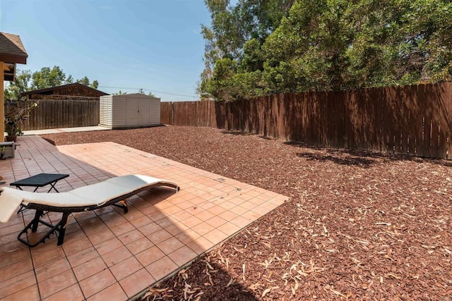 view of patio featuring a shed