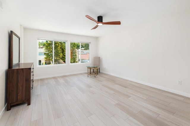 interior space featuring ceiling fan and light wood-type flooring