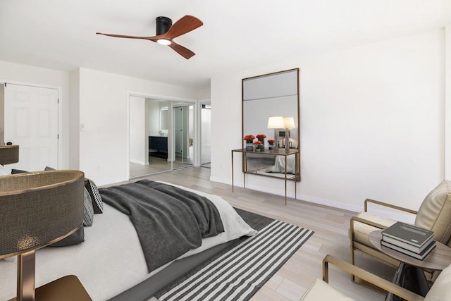 bedroom featuring ceiling fan and light hardwood / wood-style flooring