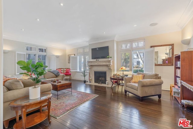 living room featuring dark hardwood / wood-style flooring and crown molding