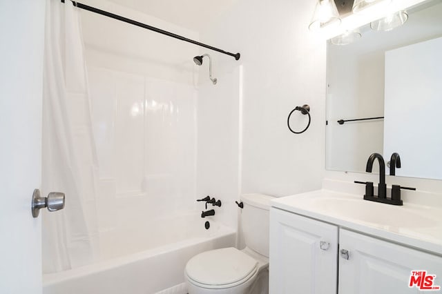 full bathroom featuring vanity, toilet, and washtub / shower combination