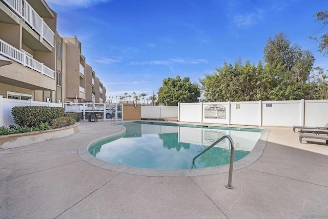 view of pool with a patio area