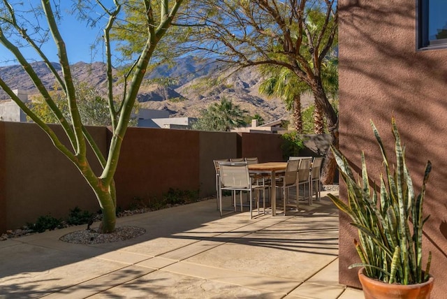 view of patio featuring a mountain view