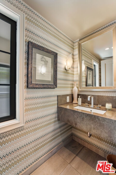 bathroom featuring sink and tile patterned floors