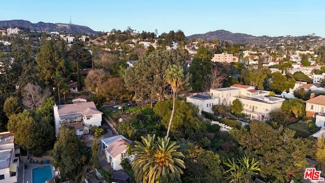 drone / aerial view featuring a mountain view