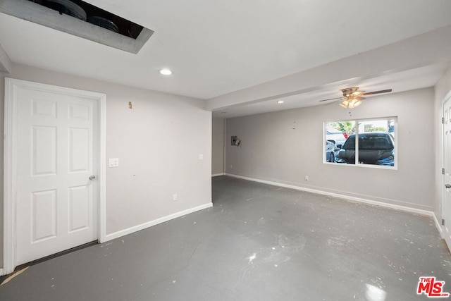 empty room featuring ceiling fan