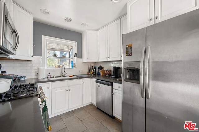 kitchen featuring white cabinetry and stainless steel appliances