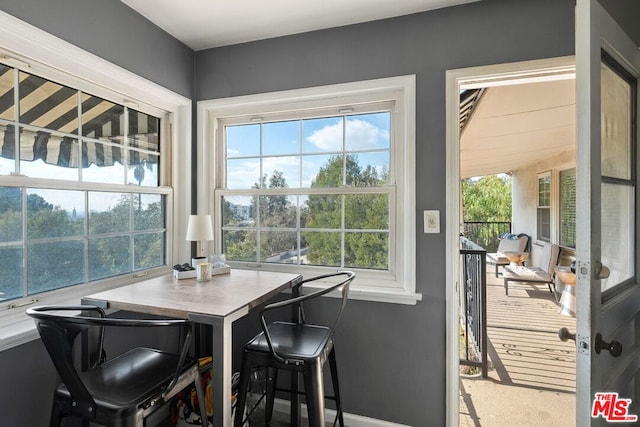 dining room featuring plenty of natural light