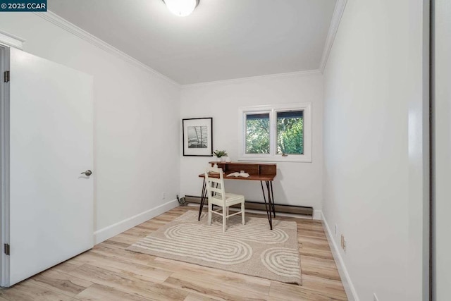 office space featuring crown molding and light hardwood / wood-style floors