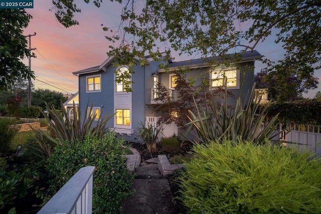 view of property exterior at dusk