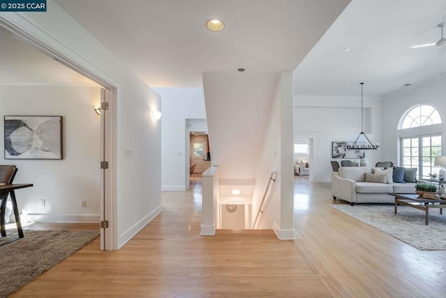 hall with light wood-type flooring