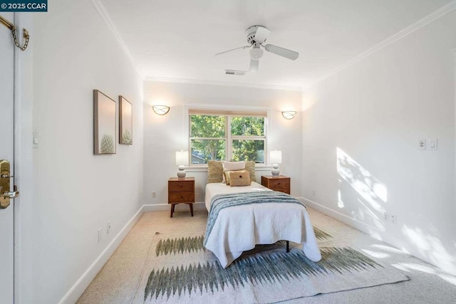 bedroom featuring ceiling fan and crown molding