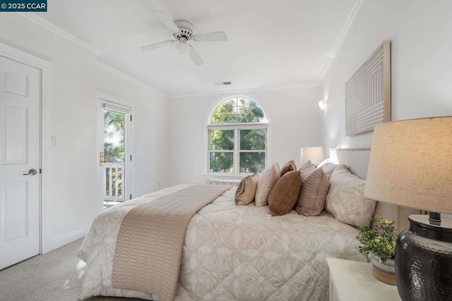 carpeted bedroom featuring ceiling fan, ornamental molding, and access to outside