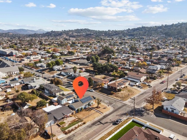 drone / aerial view featuring a mountain view