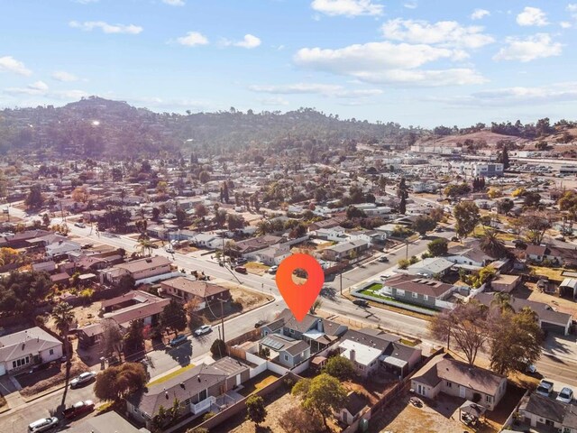 drone / aerial view featuring a mountain view