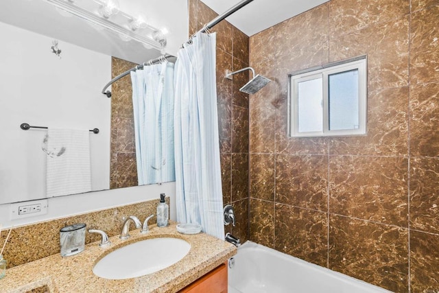 bathroom with vanity and shower / tub combo with curtain