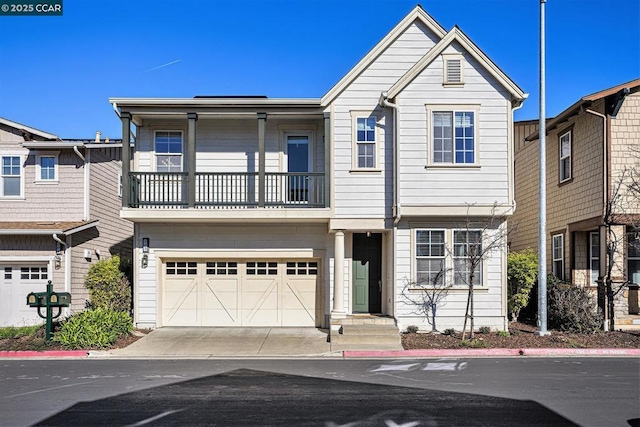 townhome / multi-family property featuring a garage