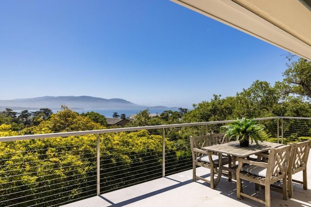 balcony featuring a mountain view