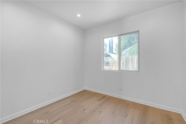 74357437 Balcom Ave, Reseda, CA 91335 - unfurnished room featuring light wood finished floors, baseboards, and recessed lighting