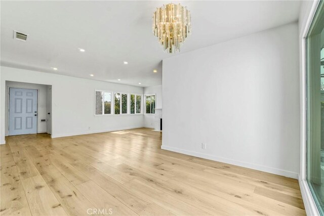 74357437 Balcom Ave, Reseda, CA 91335 - empty room with recessed lighting, a chandelier, light wood-type flooring, and baseboards