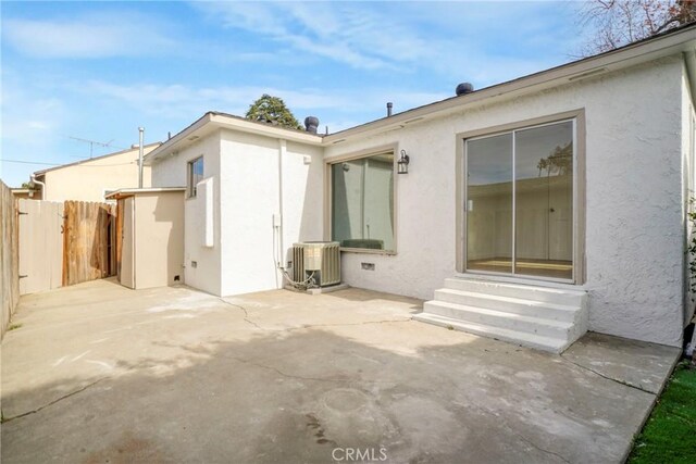 74357437 Balcom Ave, Reseda, CA 91335 - rear view of house with entry steps, stucco siding, fence, and a patio