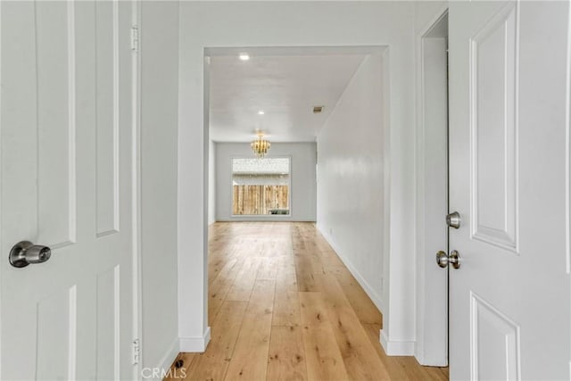 corridor featuring light wood-type flooring