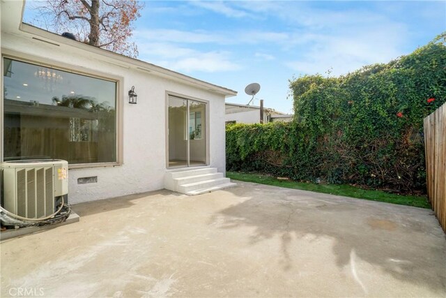 74357437 Balcom Ave, Reseda, CA 91335 - view of patio / terrace featuring entry steps, central air condition unit, and fence