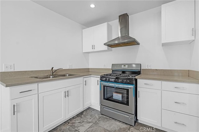 74357437 Balcom Ave, Reseda, CA 91335 - kitchen featuring wall chimney exhaust hood, gas range, a sink, white cabinets, and recessed lighting