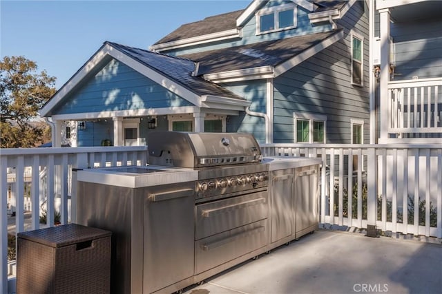 view of patio / terrace with exterior kitchen