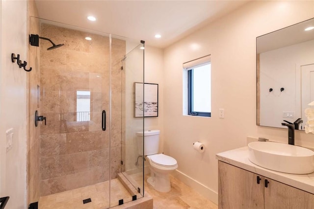 bathroom featuring vanity, an enclosed shower, tile patterned flooring, and toilet