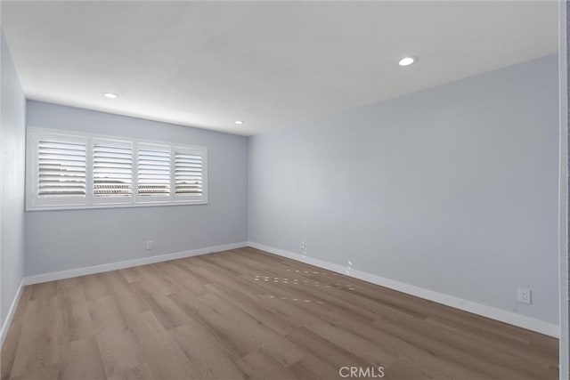 empty room with light wood-type flooring