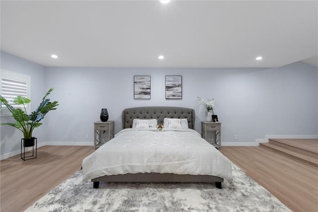 bedroom with light hardwood / wood-style floors