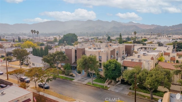 bird's eye view with a mountain view