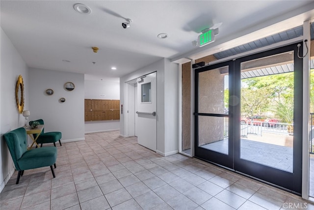 living area featuring light tile patterned floors