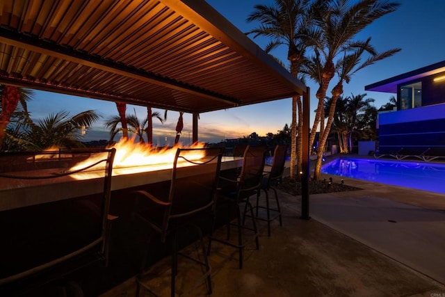 1095 Hoover St, Carlsbad, CA 92008 - patio terrace at dusk with a patio