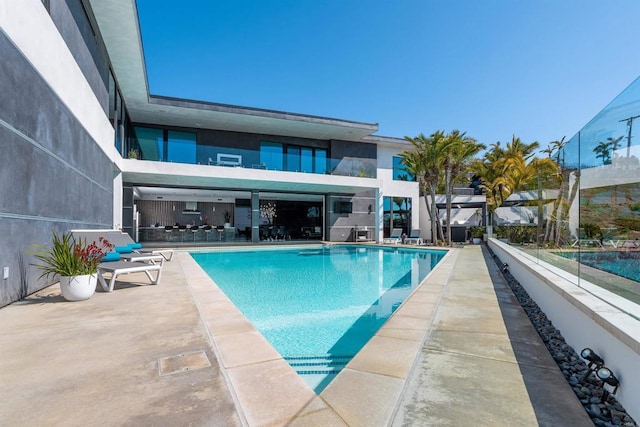 1095 Hoover St, Carlsbad, CA 92008 - community pool with a patio area