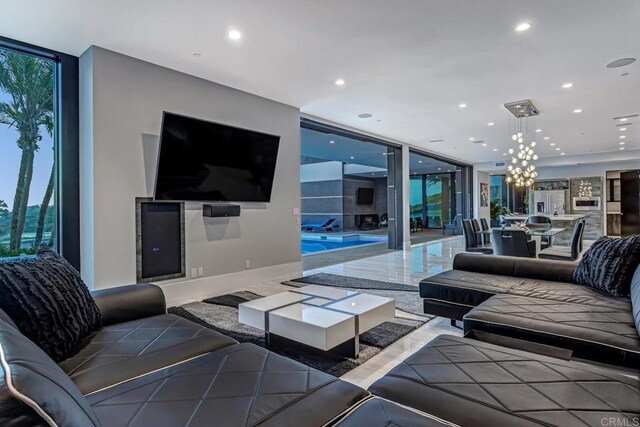 1095 Hoover St, Carlsbad, CA 92008 - living room with floor to ceiling windows and recessed lighting