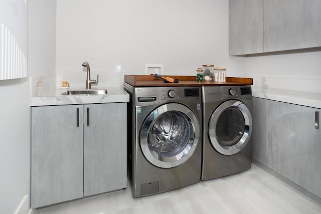 1095 Hoover St, Carlsbad, CA 92008 - laundry area with washing machine and clothes dryer and cabinet space