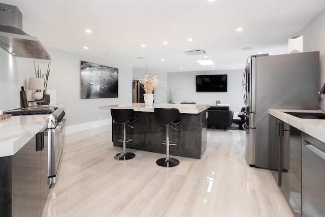 1095 Hoover St, Carlsbad, CA 92008 - kitchen with modern cabinets, wall chimney range hood, stainless steel appliances, light countertops, and recessed lighting