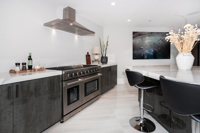 1095 Hoover St, Carlsbad, CA 92008 - kitchen with double oven range, range hood, modern cabinets, recessed lighting, and dark cabinets