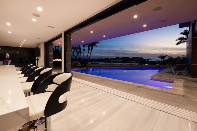 1095 Hoover St, Carlsbad, CA 92008 - pool at dusk with an outdoor pool