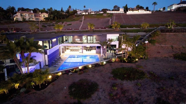 1095 Hoover St, Carlsbad, CA 92008 - rear view of house featuring an outdoor pool and a patio