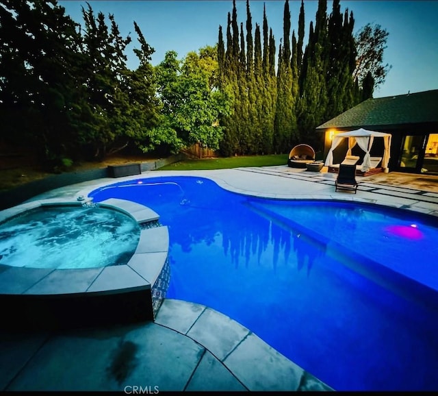 view of pool with a gazebo and a patio