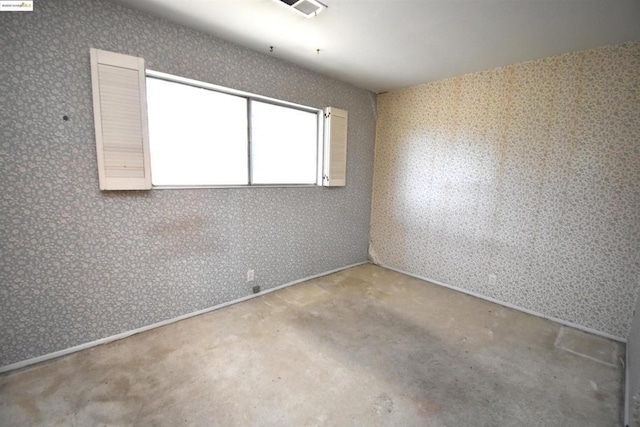 empty room featuring concrete floors