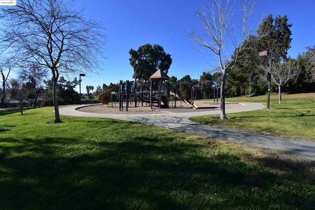 view of playground with a yard