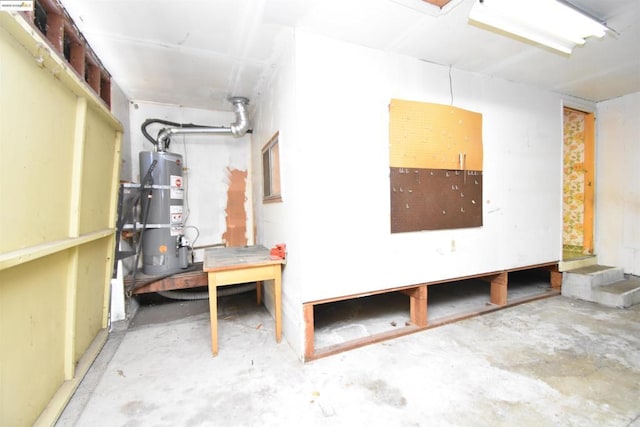 basement featuring secured water heater