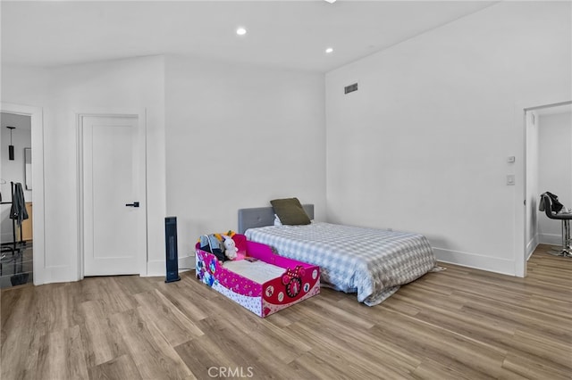 bedroom featuring light wood-type flooring