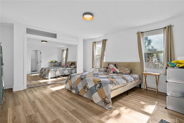 bedroom featuring light hardwood / wood-style flooring