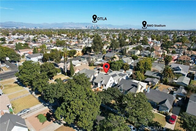 4816 7th Ave, Los Angeles, CA 90043 - aerial overview of property's location featuring nearby suburban area and mountains