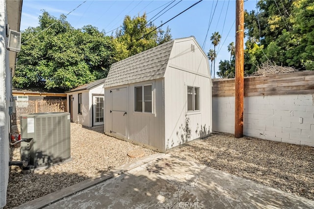 4816 7th Ave, Los Angeles, CA 90043 - view of outbuilding featuring cooling unit, a fenced backyard, and an outdoor structure